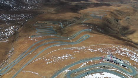 aerial drone fly curved road to mount everest north base camp in tibet, china