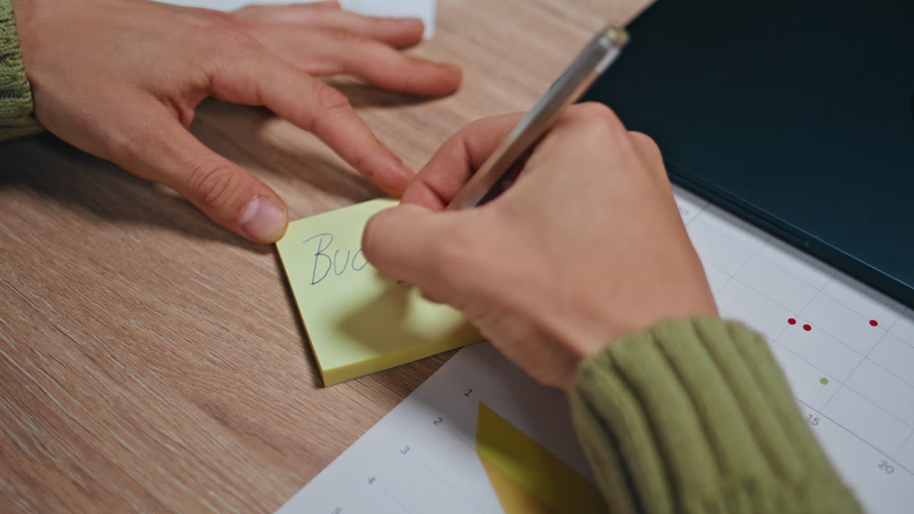 Man hand writing paper in office table closeup. Accountant calculating budget