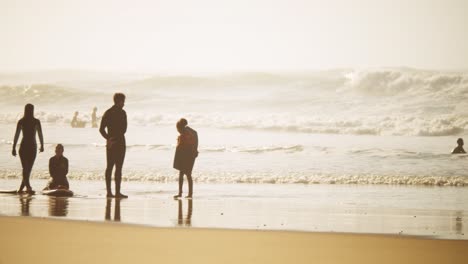 a warming misty summery scene with a family enjoying time on the beach together