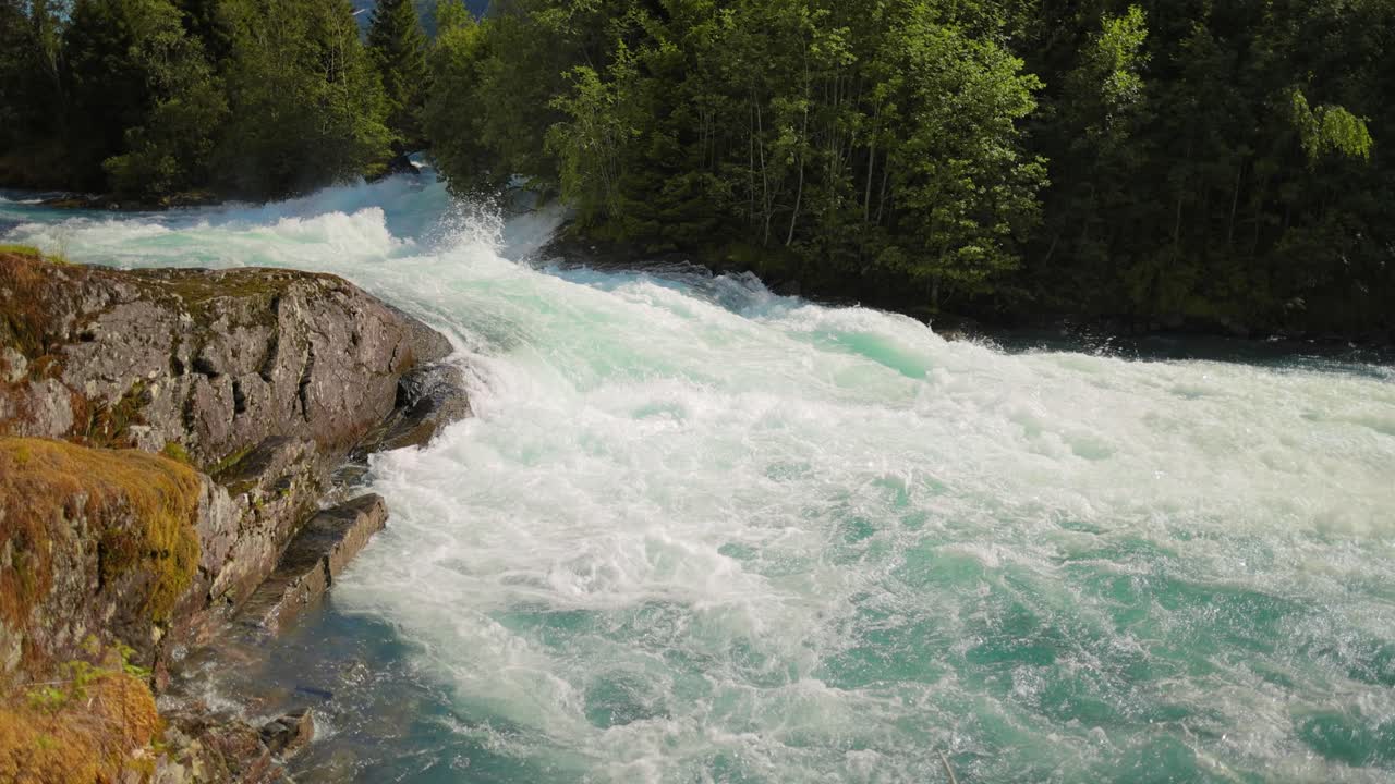 Mountain River Beautiful Nature Norway natural landscape. Lovatnet lake (also Loenvatnet) is a lake in the municipality of Stryn in Vestland county, Norway.