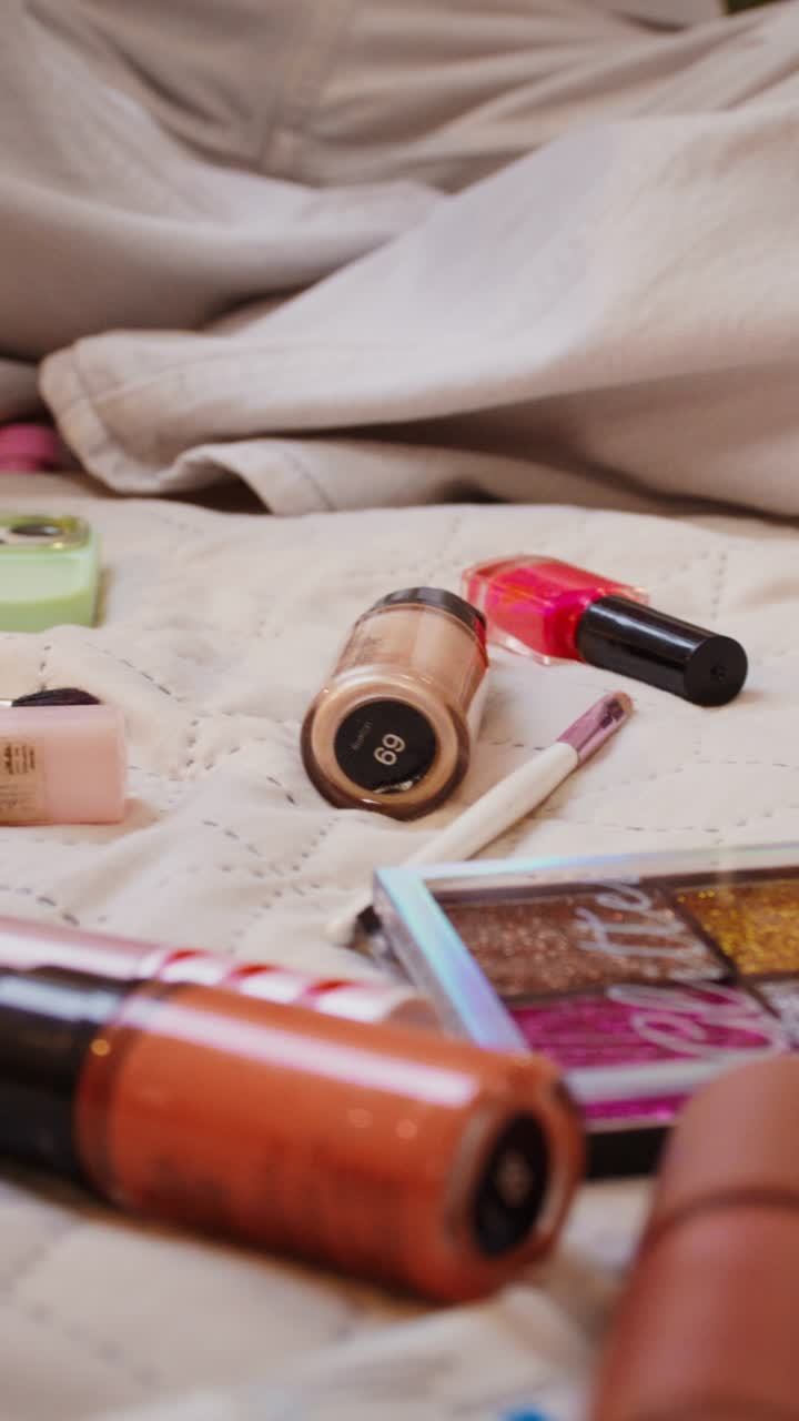 Woman with makeup products