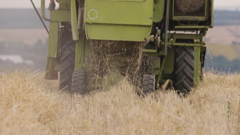 mechanized harvester harvests grain