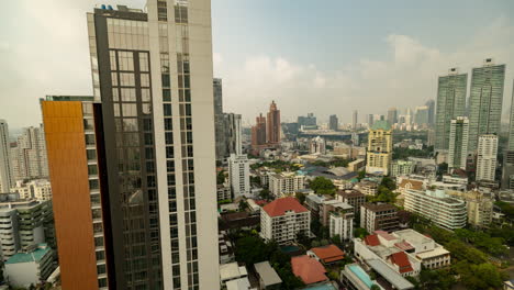 bangkok, thailand - 9 march 2025 : timelapse of the bangkok city skyline from a high vantage point