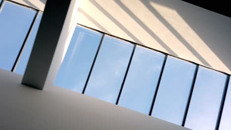 abstract shot looking up at sky light window in modern building 2