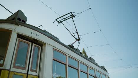 old tram passing by in morning light