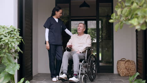 Old-man-in-wheelchair,-garden