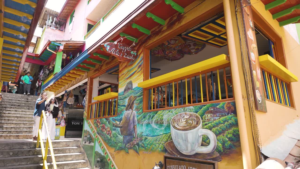 Colorful buildings in the vibrant streets of Guatapé, Colombia, with intricate painted details