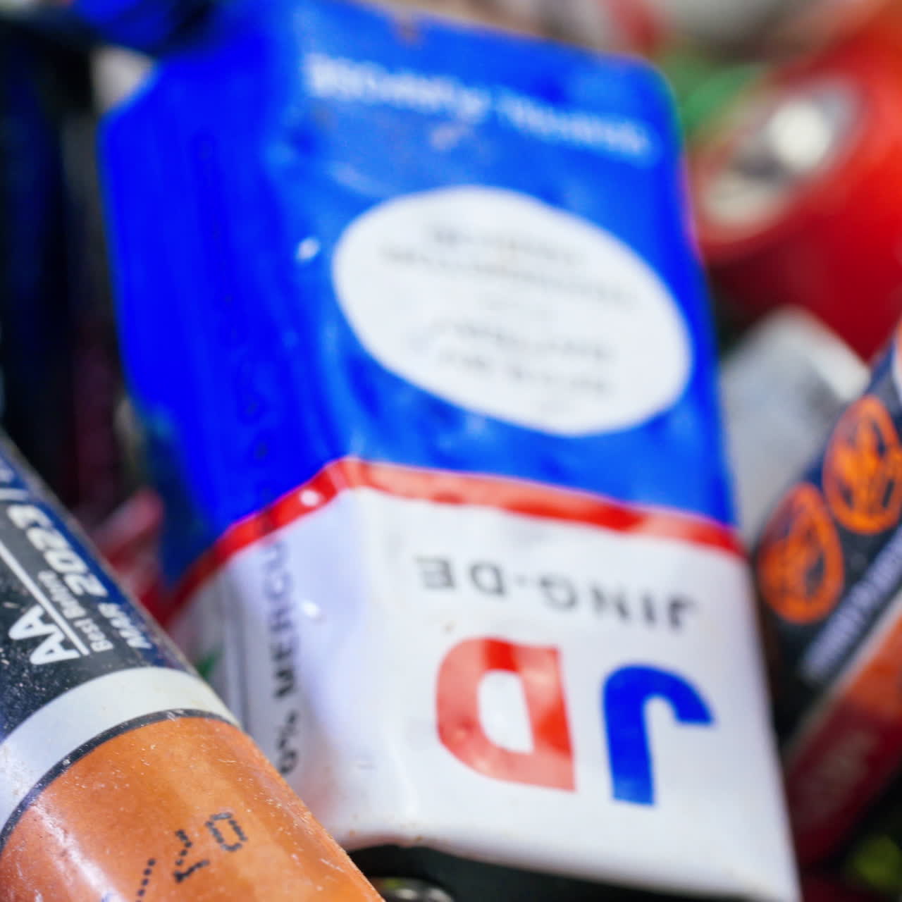 Used Alkaline Batteries. Dead Single-use Batteries before Disposal