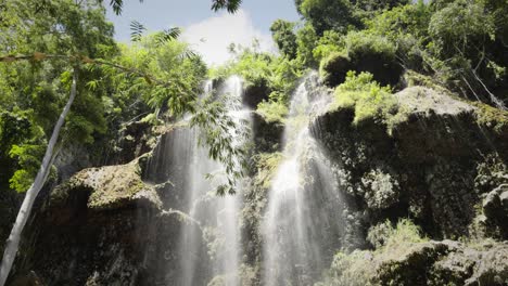 slow motion tumalog waterfalls landscape at philippines tropical summer water falling around tropical southeast asian jungle