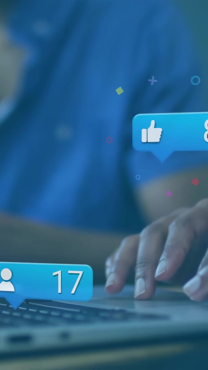 Vertikal video: Team taster på bærbar computer, sociale bobler popper op over hænderne, tal sporer metrics.