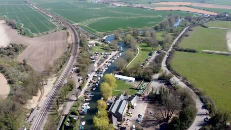 drone flies over a bridge
