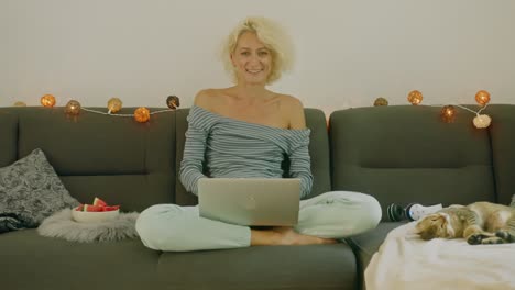 woman working from home on a couch