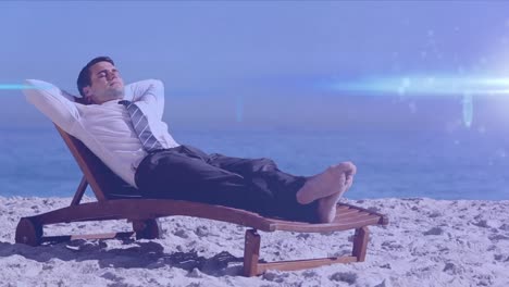 animation of light spots over caucasian businessman lying at beach