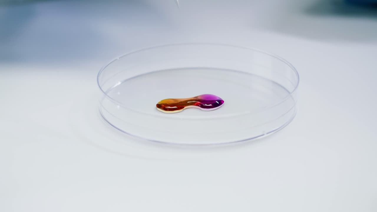 Mixing Colorful Liquid Drops in a Petri Dish with a Probe