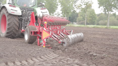 Land-being-plowed-by-tractor