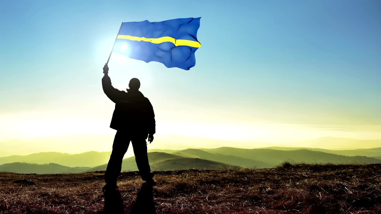 성공적인 실루 남자 우승자 산 꼭대기에 나우루 발을 흔들고, 시네마그래프 루프 배경