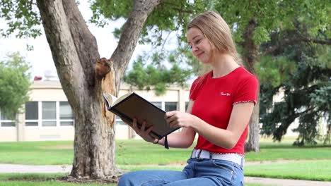 A-college-student-contemplates-the-meaning-of-what-she-has-just-read