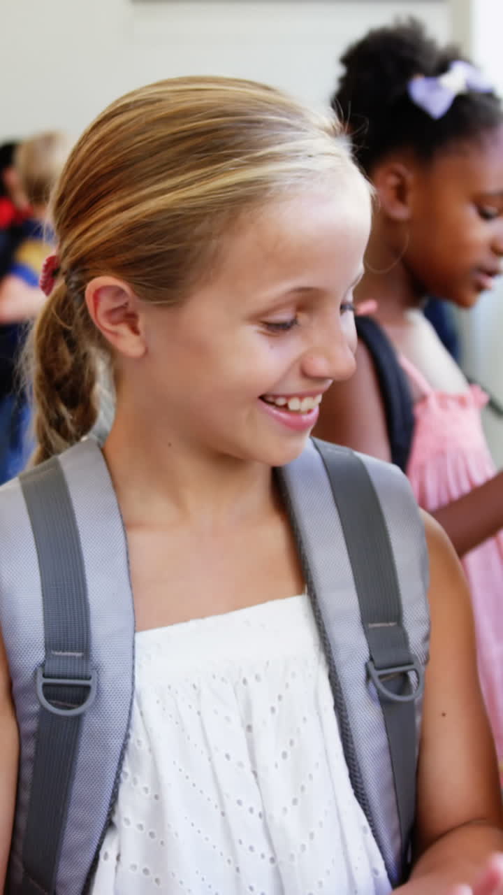 School kids giving high five to each other