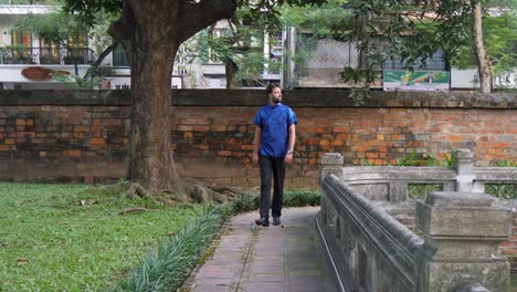 attractive, stylish and confident young man showing his asian fashion sense