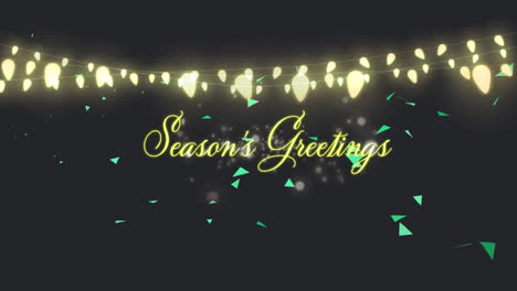 animation of christmas season's greetings text with fairy lights on black background