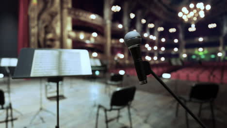 empty stage with microphone and music stand