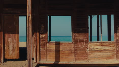 abandoned wooden beach house with sea view