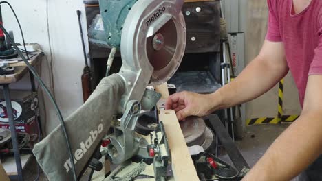 Cutting wood with electric saw