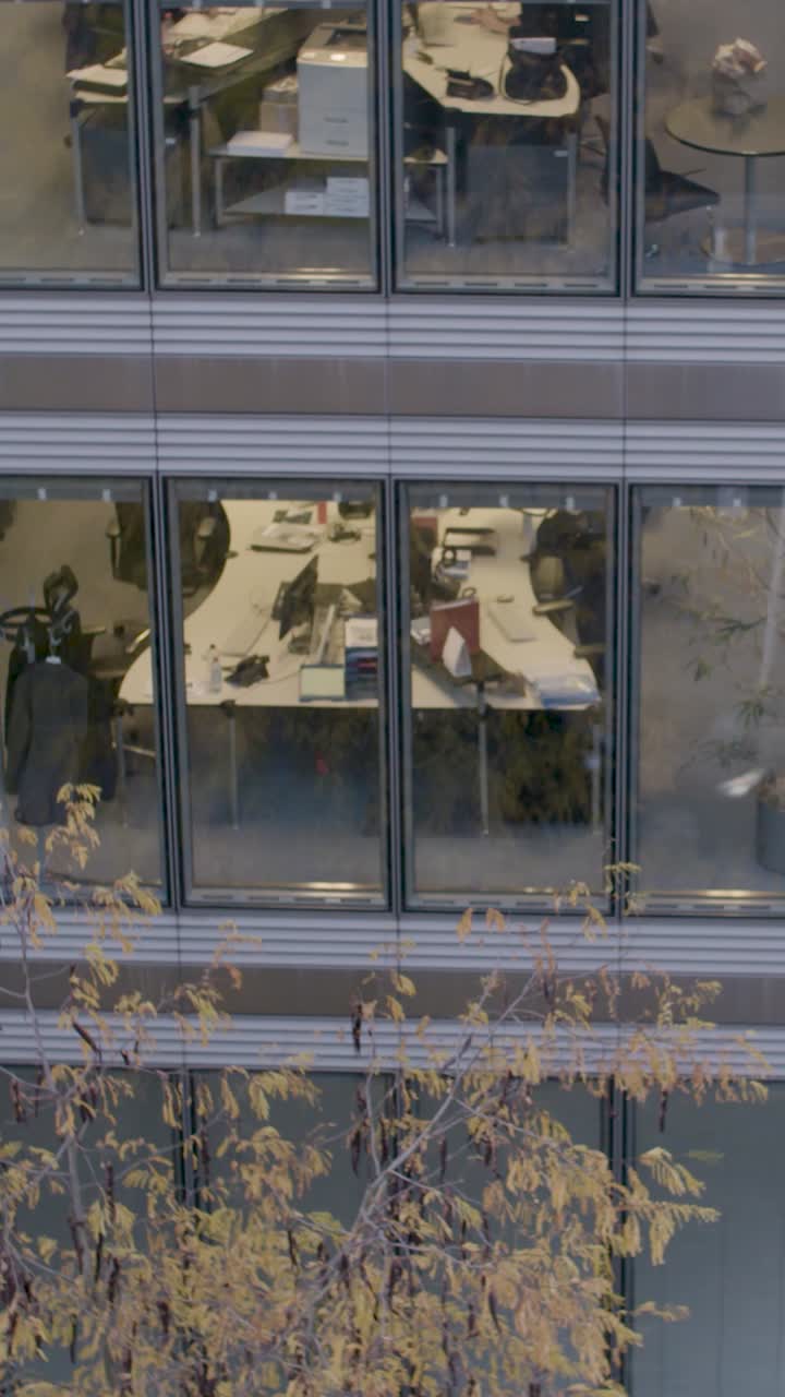 Office life in Frankfurt captured in a vertical urban setting