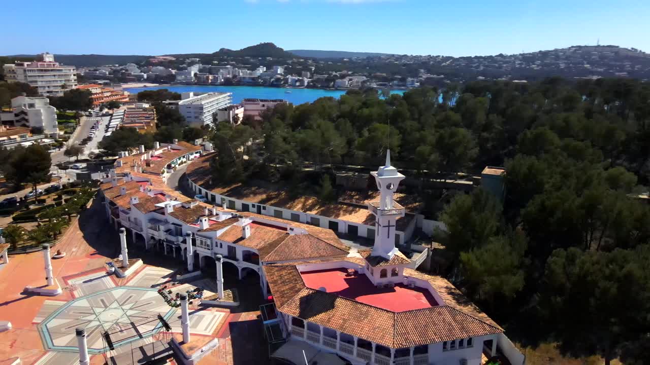 Enjoy breathtaking views of Santa Ponsa's coastal scenery and unique architecture. Observe the vibrant surroundings and peaceful atmosphere of this beautiful Mallorca destination.