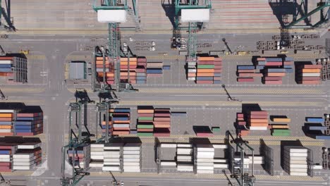 bird's eye view of san antonio port cargo area with containers in chile aerial dolly left