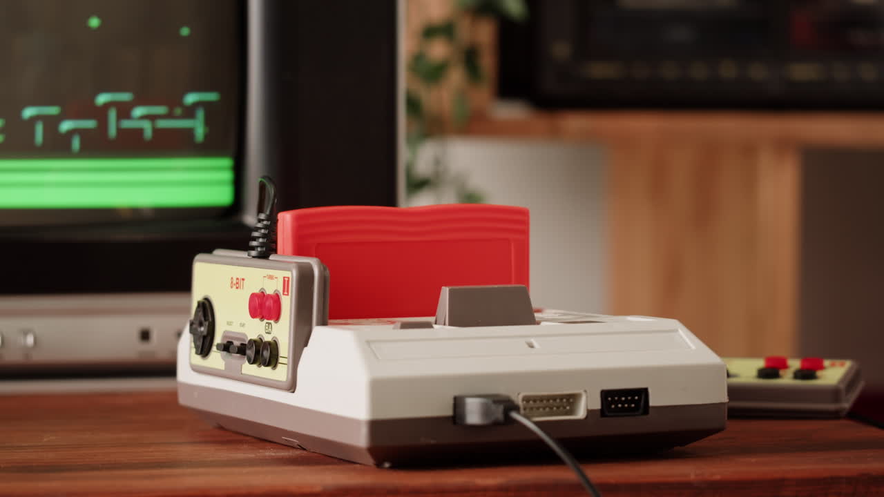 Person inserting game cartridge into a vintage Nintendo NES console.