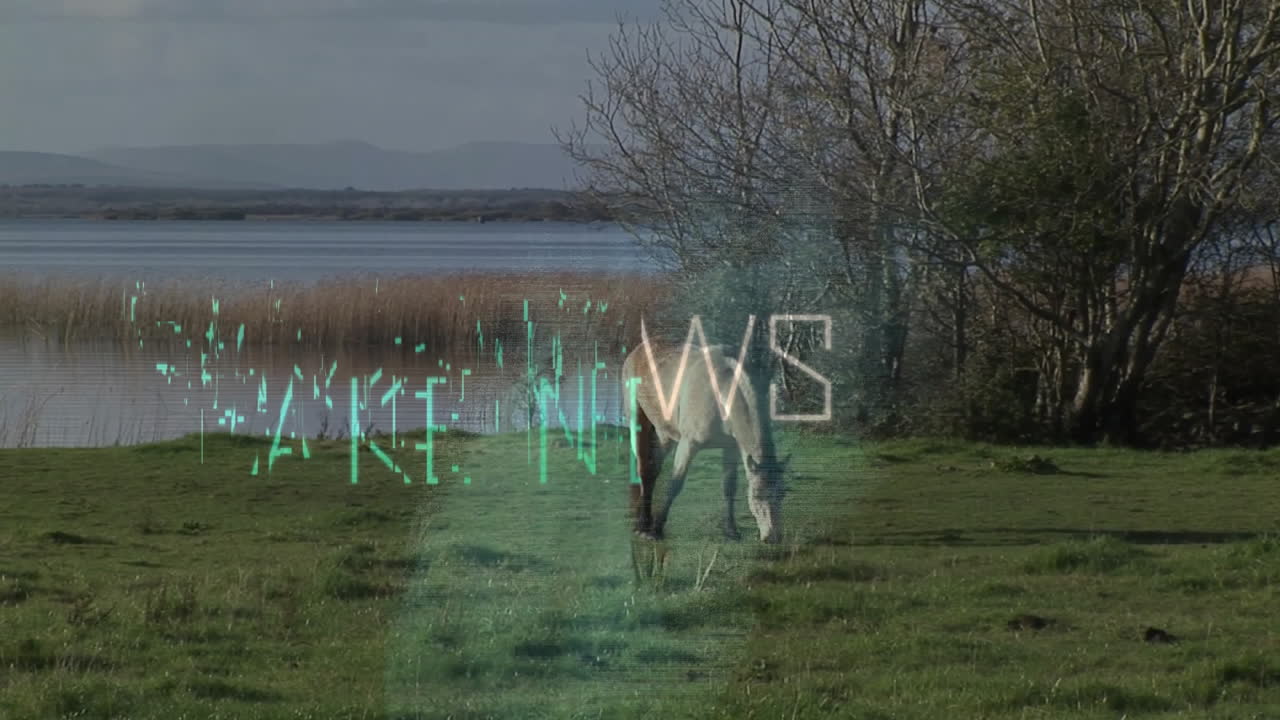 Fake news text animation over serene landscape with grazing horse by lake