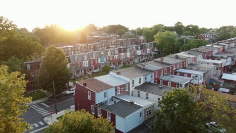 aerial reveal of congested housing projects in united states of america, american urban city poverty, beautiful dramatic lighting, establishing shot