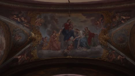 baroque church interior with religious paintings