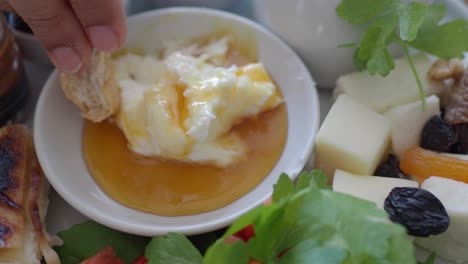 traditional turkish breakfast with honey, cheese, and yogurt