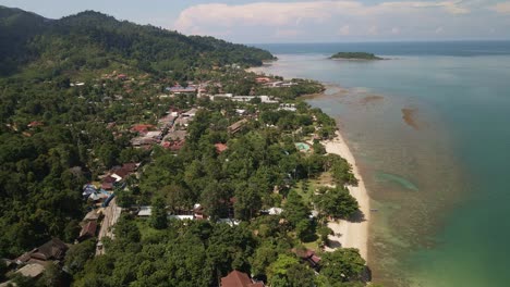 4k aerial drone footage flying over coastline in koh chang, thailand