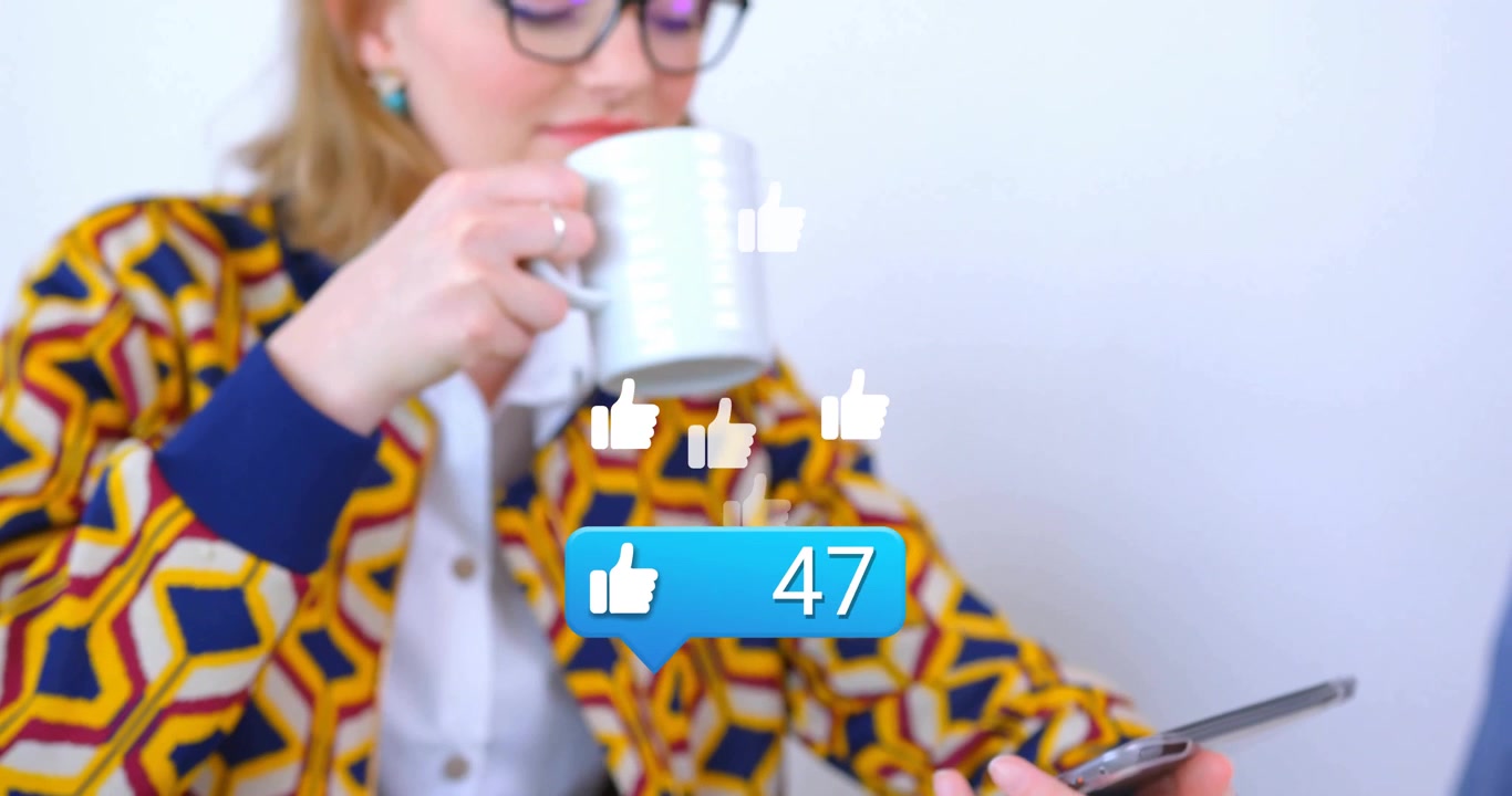 woman sipping coffee causing animated social media like icons rising to 95 while viewing tablet