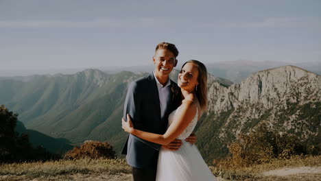 Couple Embracing in a Scenic Mountain Landscape