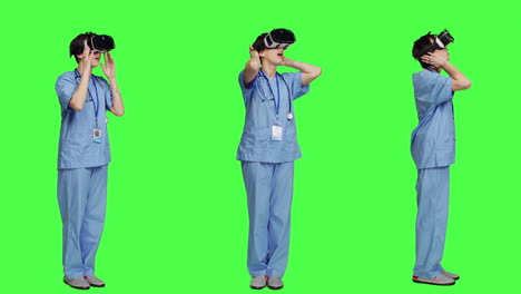 medical assistant working with virtual reality glasses against greenscreen