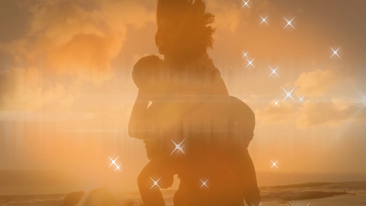 아프리카계 미국인 남자가 그의 아내를 해변에서 피기백 타고 가는 것에 대해 반 ⁇ 이는 별 아이콘