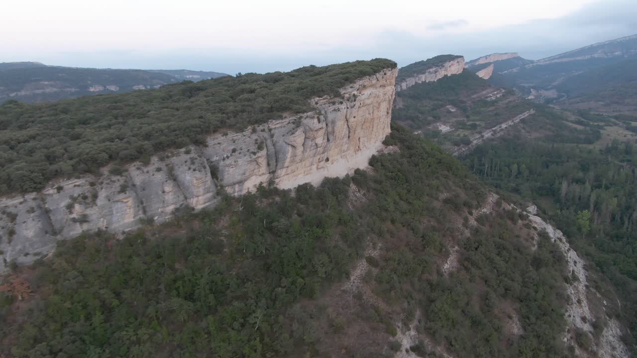 Picturesque view of rocky mountains under cloudy sky in Burgos, Spain