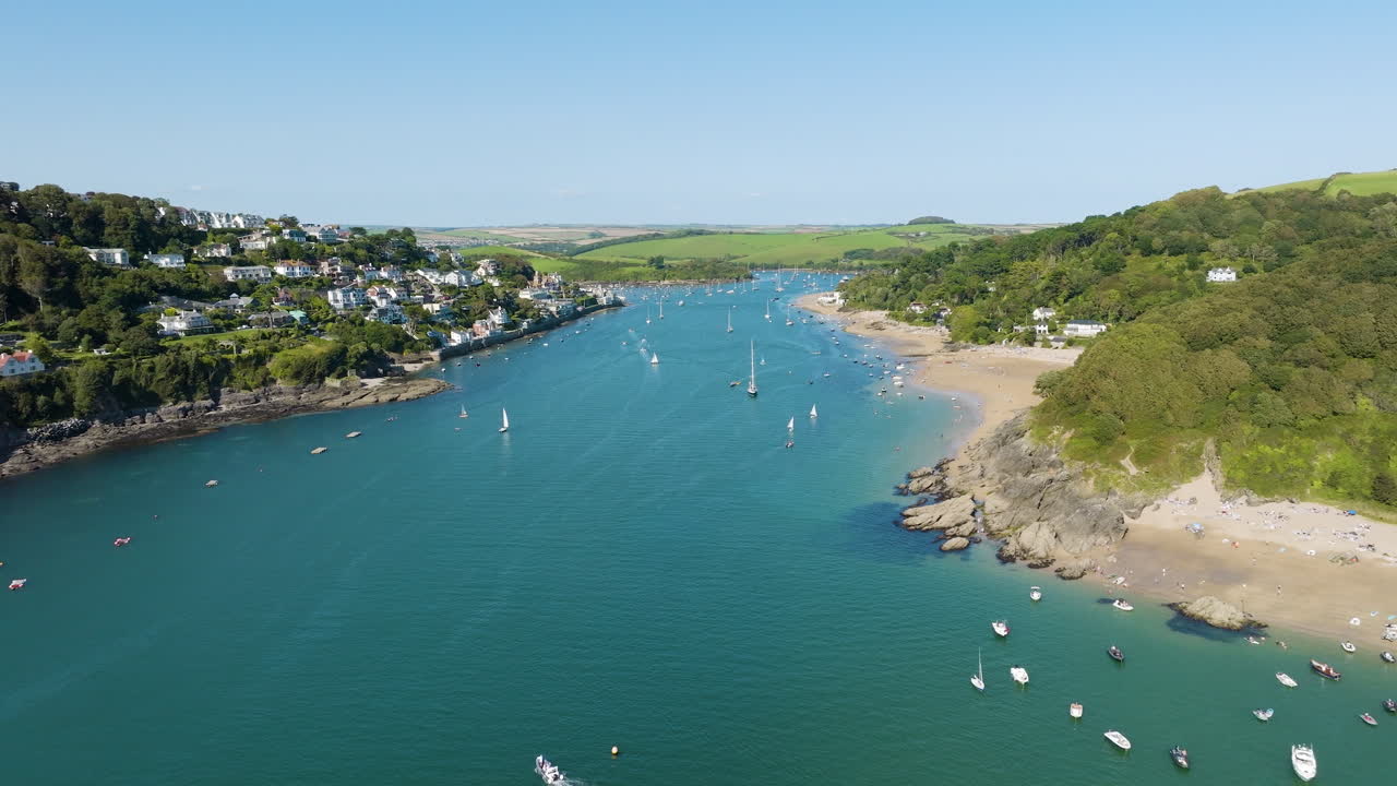 Coastal Village with River and Sailing Boats