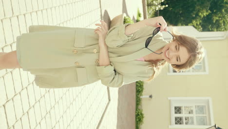 stylish woman in a green blazer