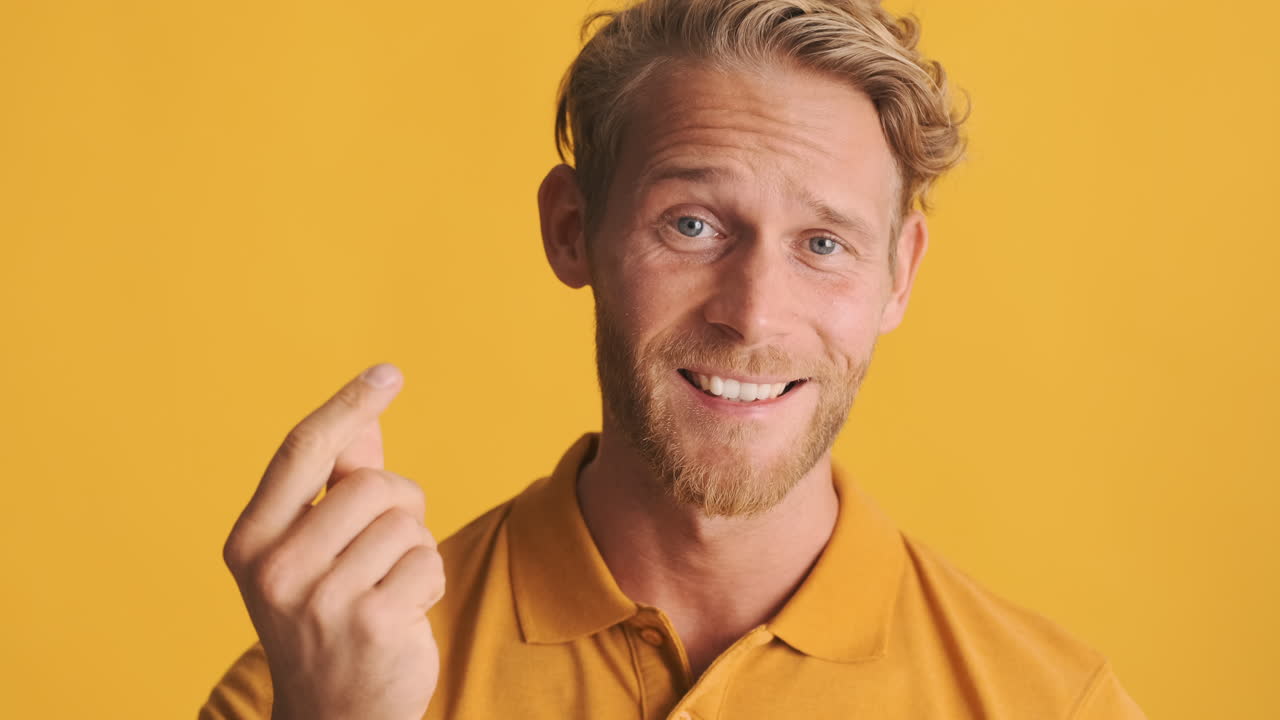 Happy young man asking for money