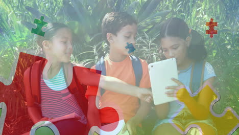 animation of colourful puzzle pieces over school children using tablets