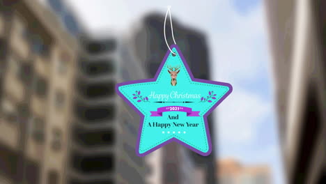 star shaped happy christmas and new year text banner against tall buildings in background