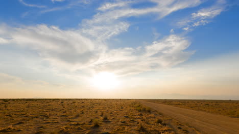 Dawn-breaks-over-the-Mojave-Desert's-arid-and-barren-landscape---static-wide-angle-time-lapse