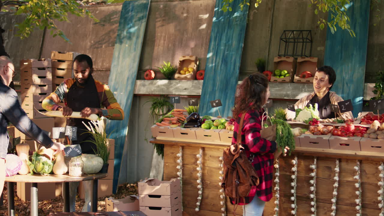 People Buying Fresh Vegetables at a Farmers Market