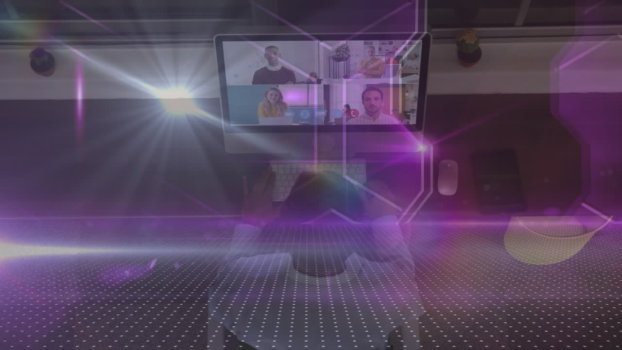 Animation of lights over african american man having video call on laptop