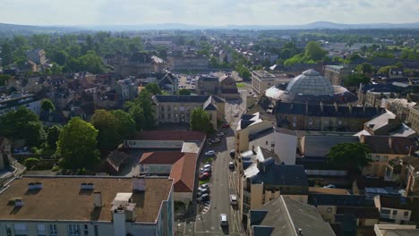 Halle-au-ble-or-wheat-market-with-Alencon-Ducal-Castle-in-background,-Orne-in-Normandie,-France